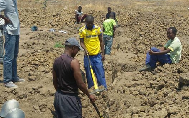 Digging foundation trenches.