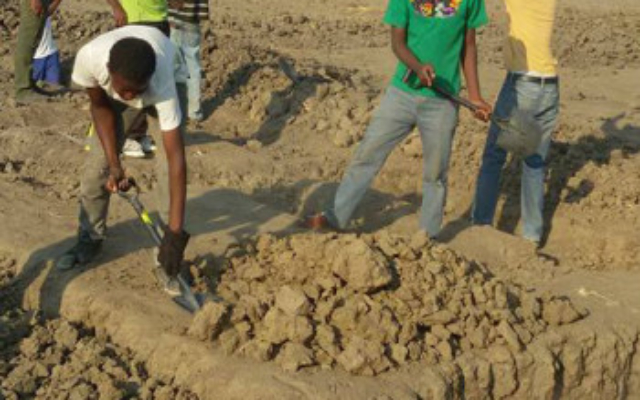 Ground is hard, but foundation must be built.